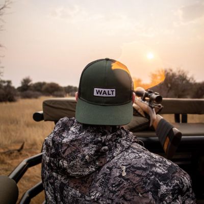 Walt Olive green trucker cap sun spot shot Walt Olive green trucker cap sun spot shot