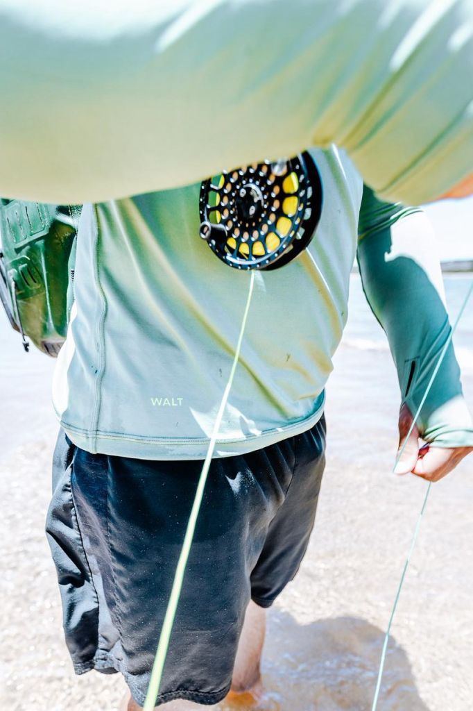 Kosi Hooded shirt with reel Kosi Hooded shirt with reel